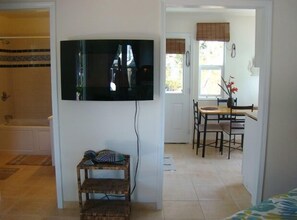4 coconut shack | Living area | 32-inch LED TV with cable channels, TV, DVD player