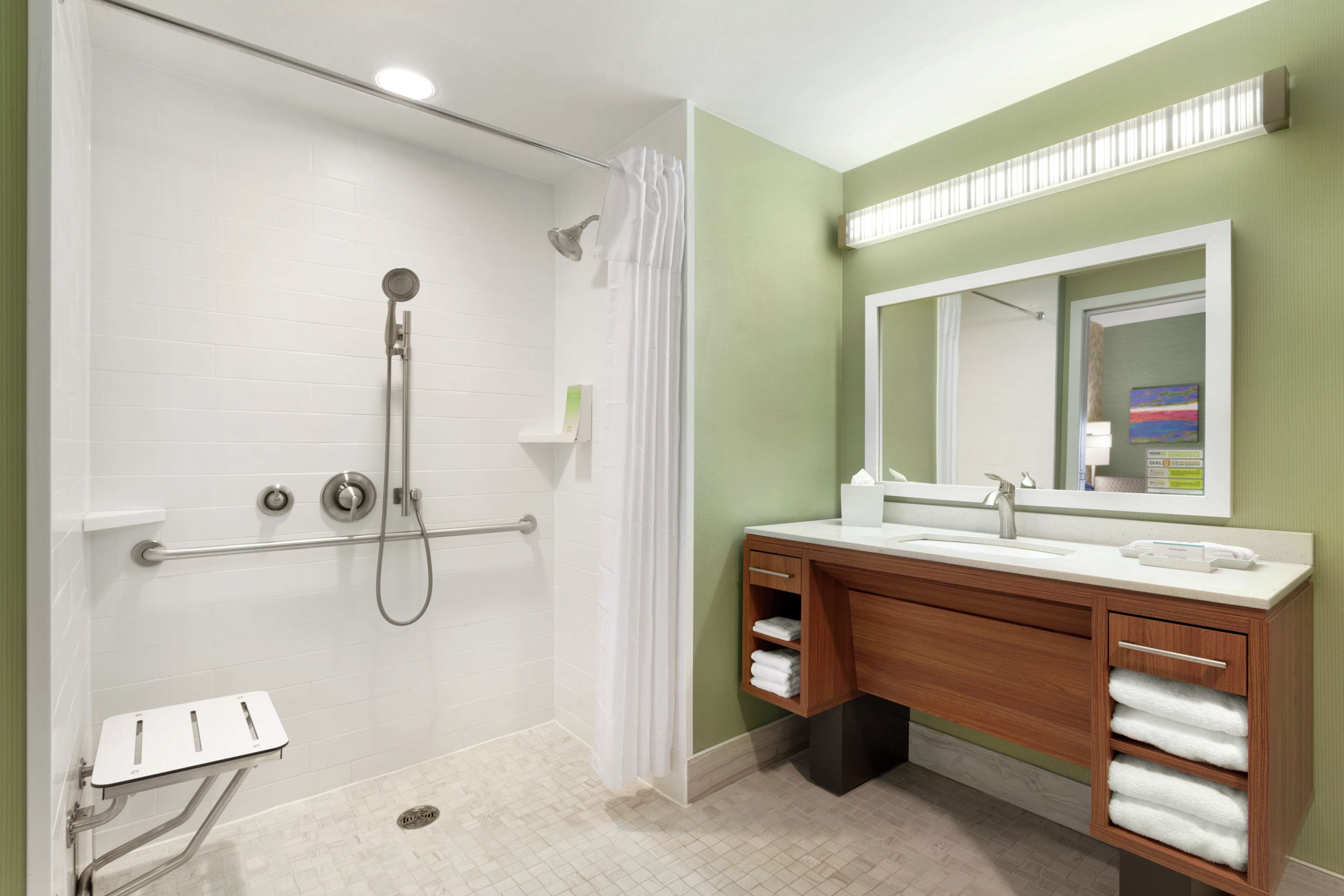 studio, 1 queen bed, accessible (roll-in shower) | bathroom | combined shower/bathtub, towels