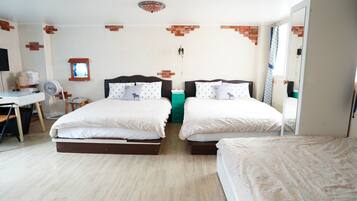 Hypo-allergenic bedding, desk, laptop workspace, blackout curtains