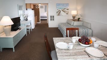 Deluxe Suite, Kitchenette (Oceanfront) | Living area | Flat-screen TV
