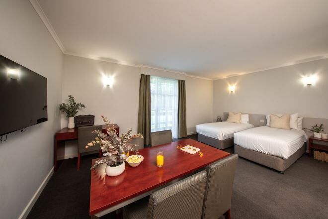 Premium bedding, blackout drapes, iron/ironing board, cribs/infant beds