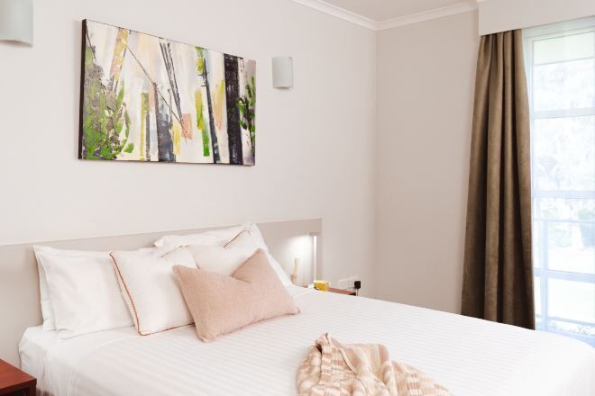 Premium bedding, blackout drapes, iron/ironing board, cribs/infant beds