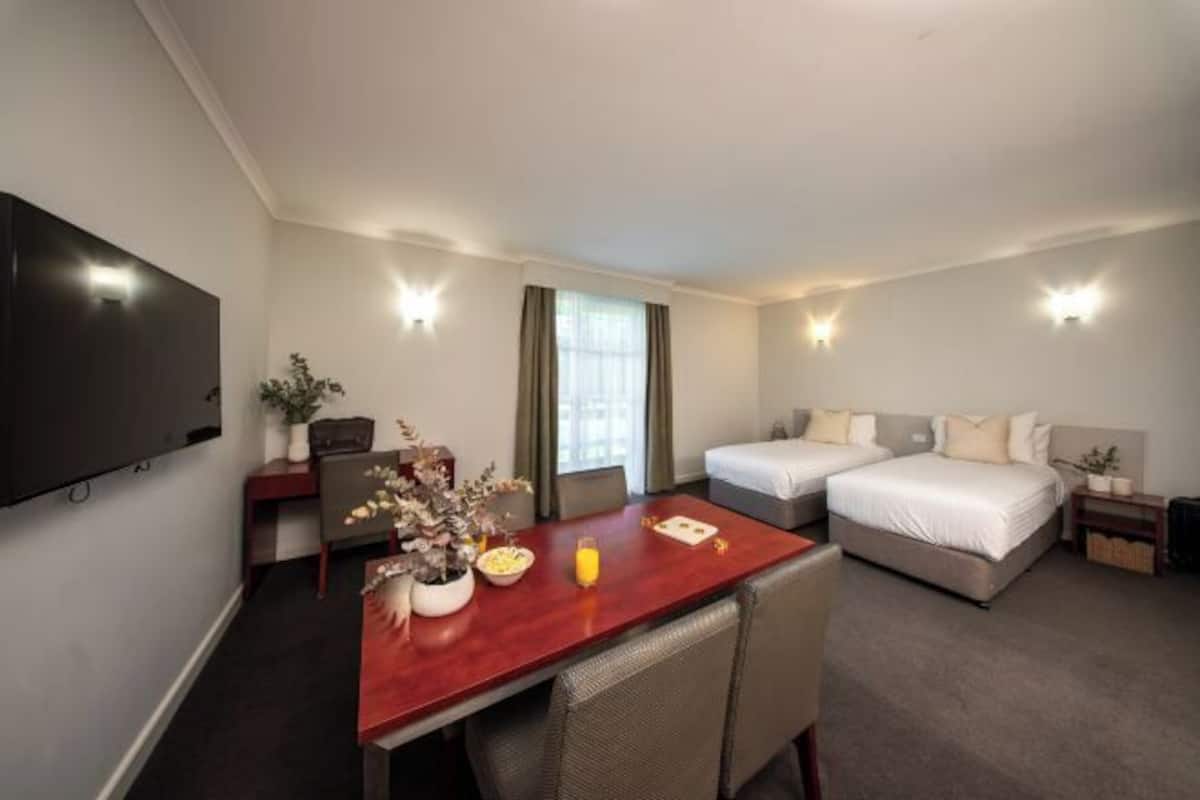 Premium bedding, blackout drapes, iron/ironing board, cribs/infant beds