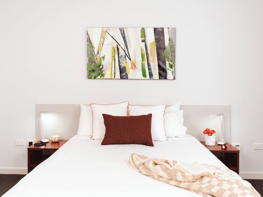 Premium bedding, blackout curtains, iron/ironing board, cots/infant beds