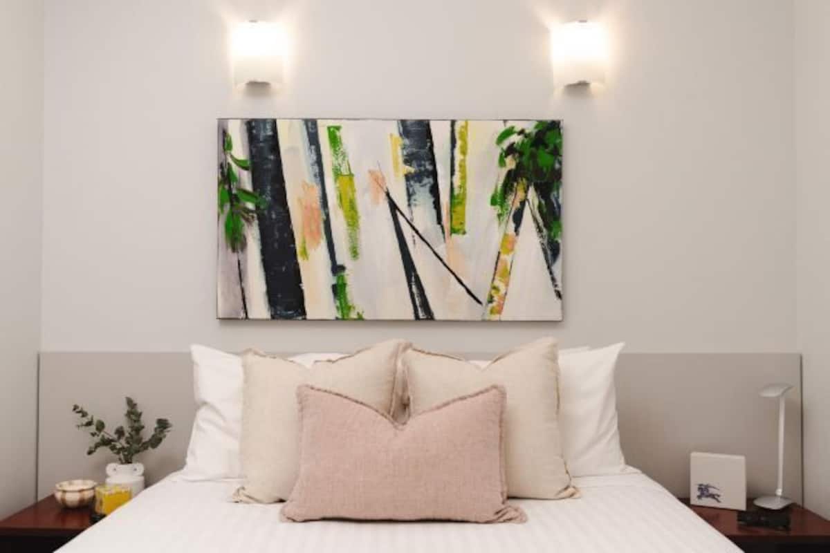 Premium bedding, blackout drapes, iron/ironing board, cribs/infant beds