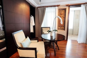 Arunreas Majestic | Living area | 42-inch flat-screen TV with cable channels, TV, DVD player