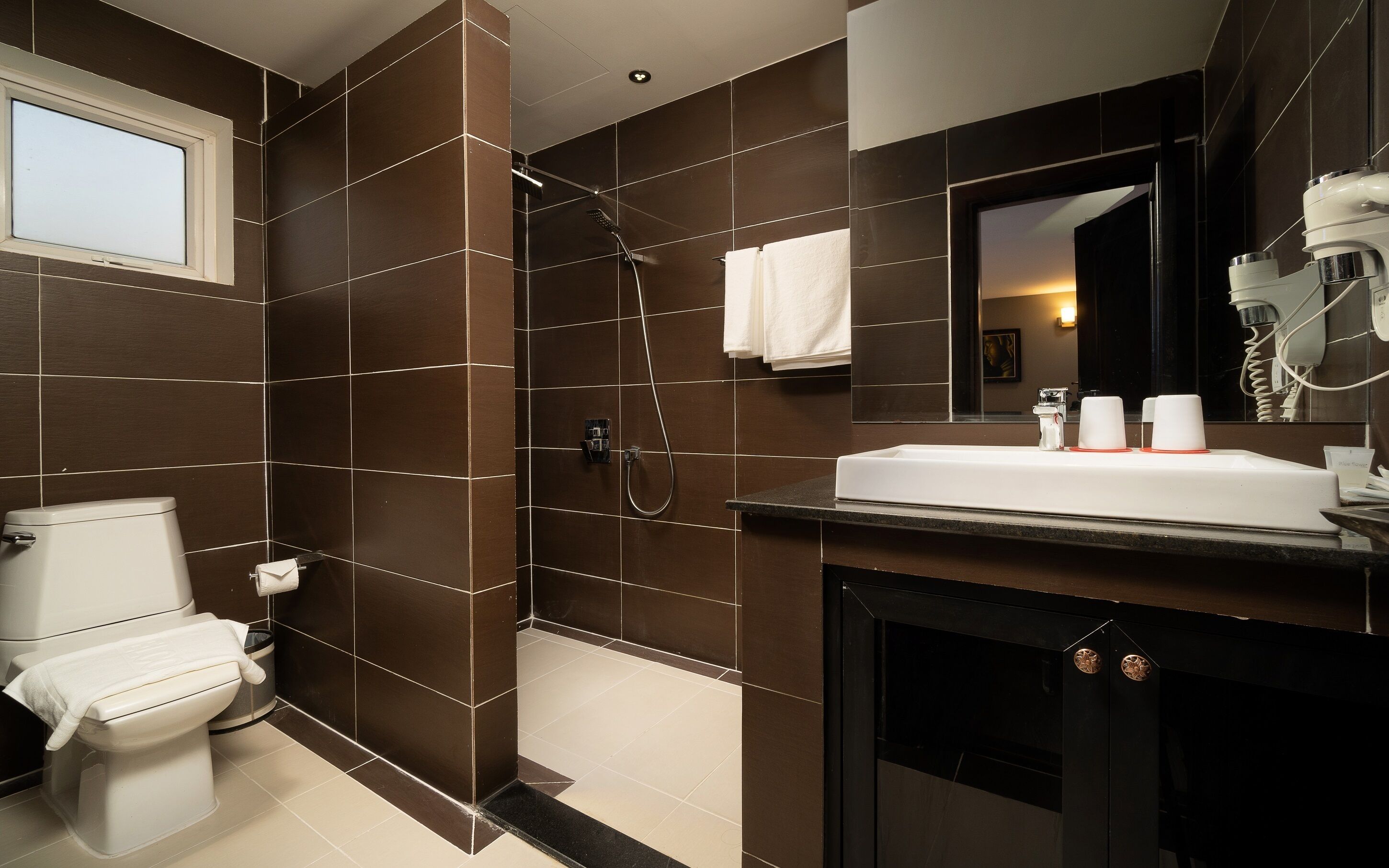 superior double room | bathroom | shower, rainfall showerhead, free toiletries, hair dryer