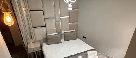 Standard Double or Twin Room | Minibar, in-room safe, desk, laptop workspace