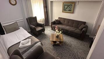 Family Suite | Minibar, in-room safe, desk, laptop workspace