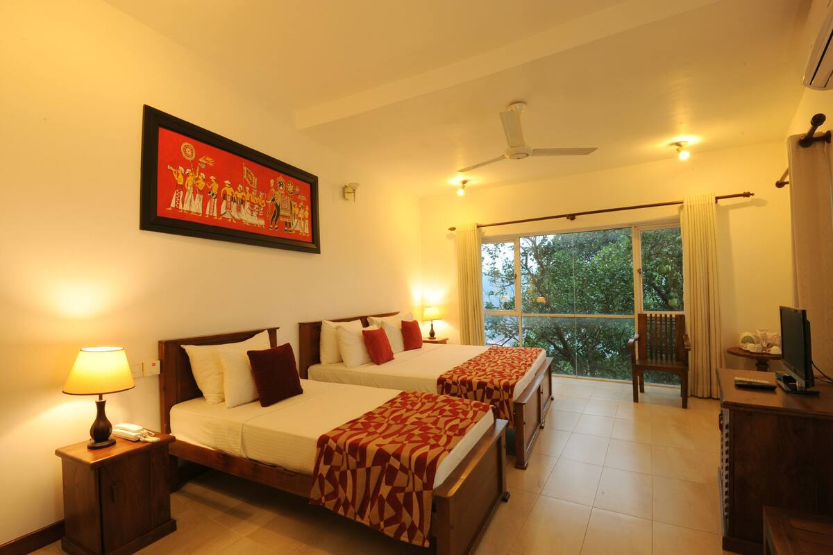 Deluxe Triple Room, Lake View | Minibar, desk, iron/ironing board, free WiFi
