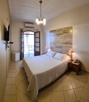 Chambre Simple | Minibar, coffres-forts dans les chambres, rideaux occultants