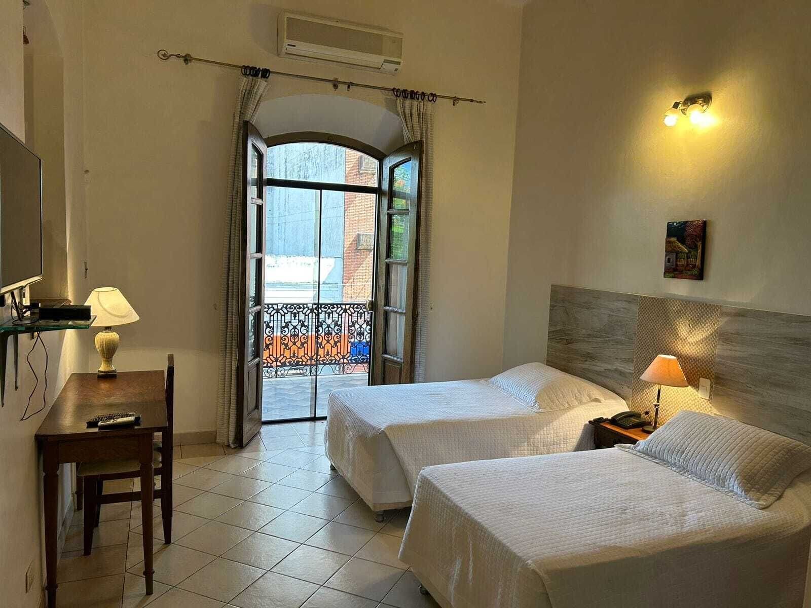 double or twin room | minibar, in-room safe, blackout curtains, free wifi