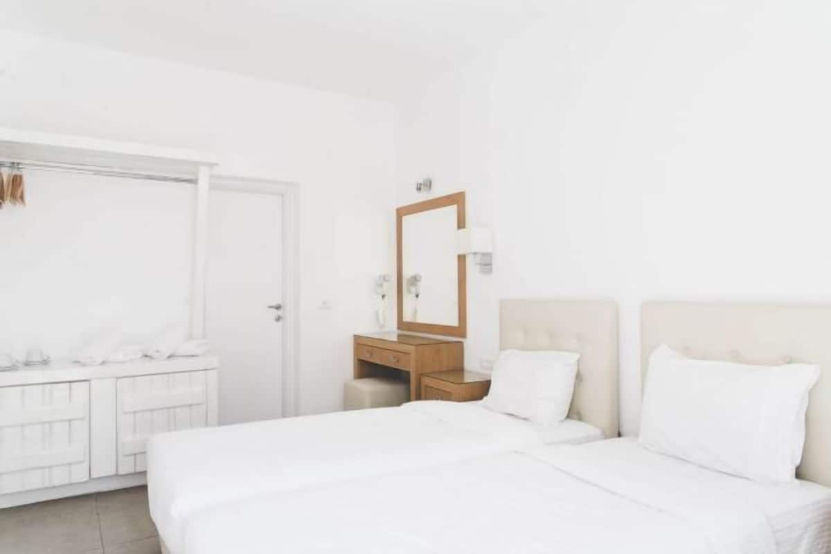 Ropa de cama de alta calidad y minibar