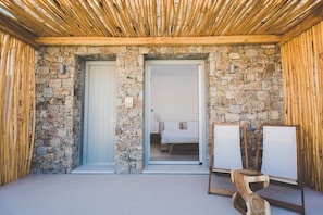 Junior Suite, Pool View | Premium bedding, minibar, in-room safe, soundproofing