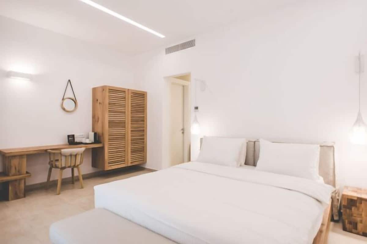 Ropa de cama de alta calidad y minibar