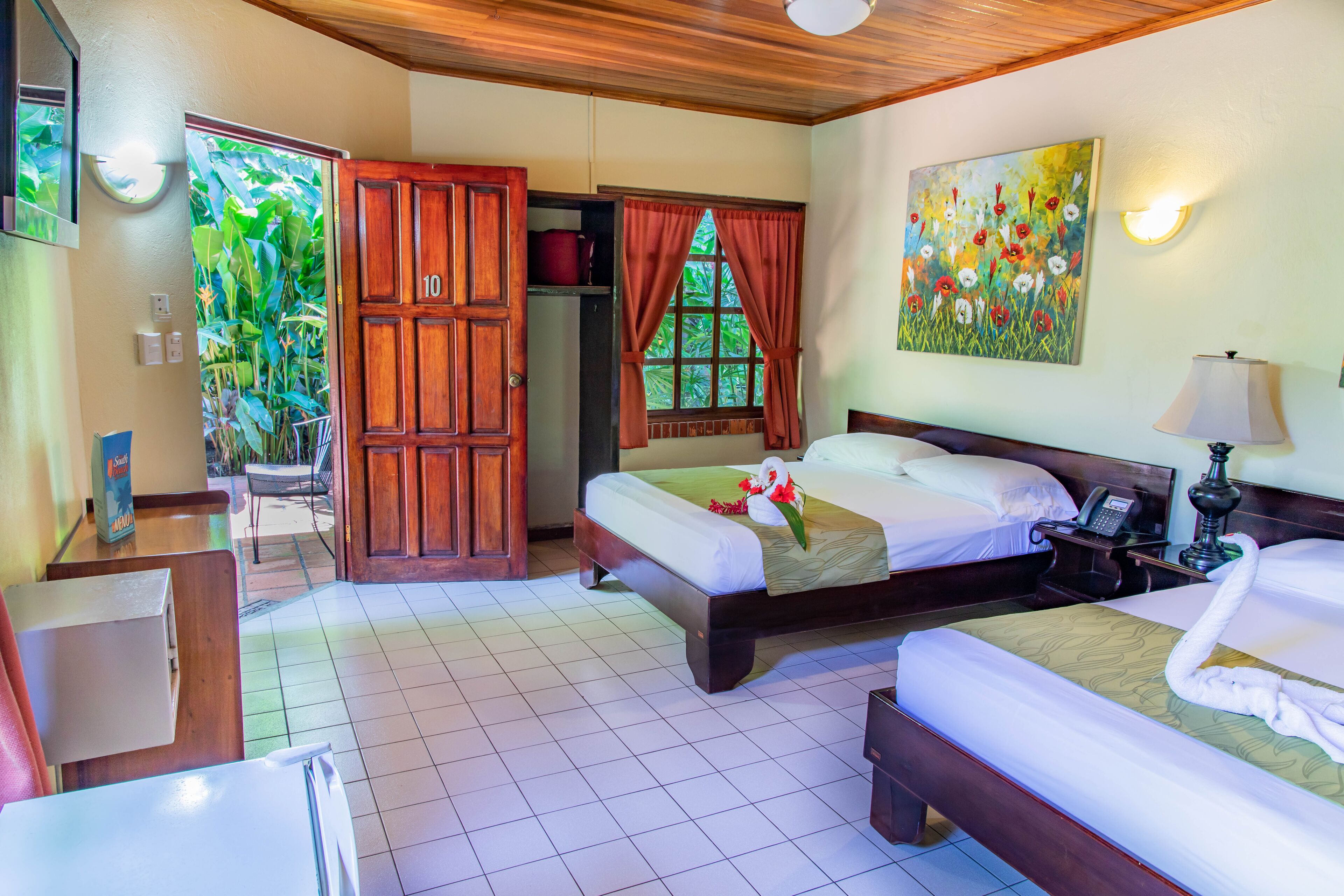 double room, 2 double beds, garden view, garden area | in-room safe, desk, free wifi, bed sheets