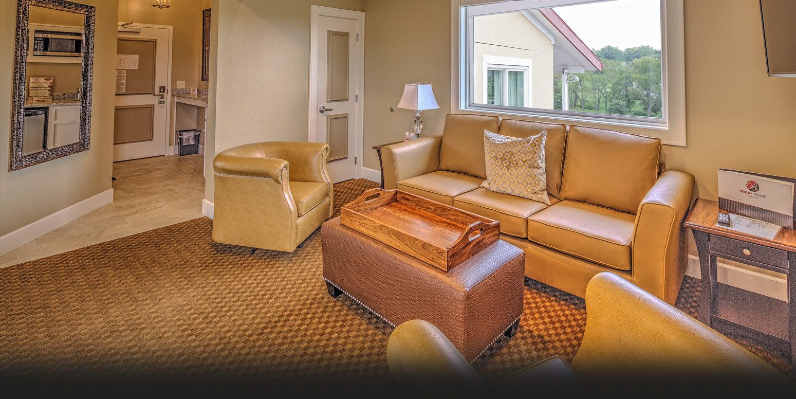 king suite with balcony (403) | living area | flat-screen tv