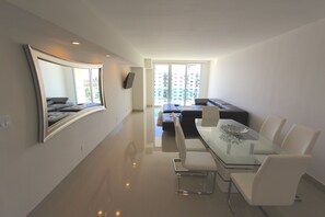 Classic Apartment, 2 Bedrooms, Bay View (OR1610) | Living area | 50-inch flat-screen TV with cable channels, TV - Ocean Reserve Apartments by FlatsAway (Sunny Isles Beach)