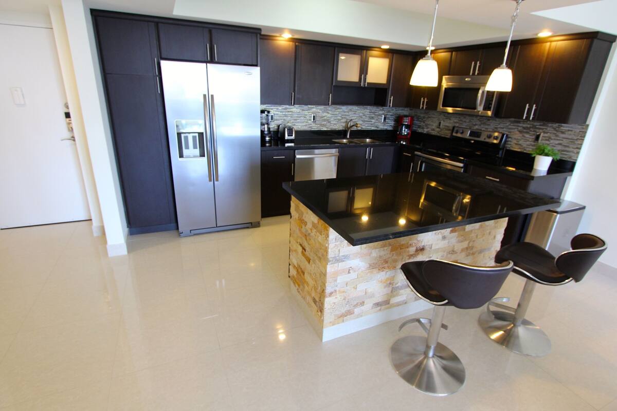 Luxury Apartment, 1 Bedroom, Ocean View (OR1520) | Private kitchen | Coffee/tea maker, full-size fridge, microwave, stovetop
