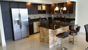 Coffee/tea maker, full-sized fridge, microwave, stovetop - Ocean Reserve Apartments by FlatsAway (Sunny Isles Beach)