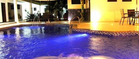 Outdoor pool, pool umbrellas, sun loungers