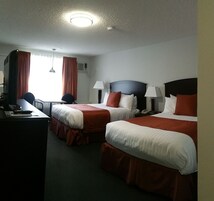 Standard Room, 2 Queen Beds | Desk, blackout drapes, iron/ironing board, free WiFi