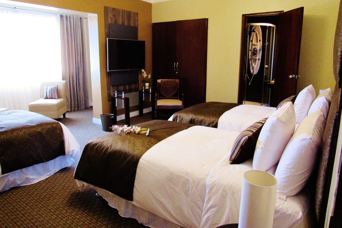 Premium bedding, down duvets, Select Comfort beds, minibar