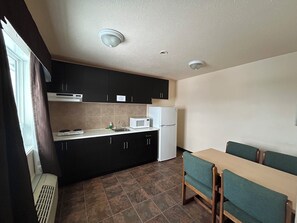 Room, 2 Queen Beds, Non Smoking (Efficiency) | In-room dining