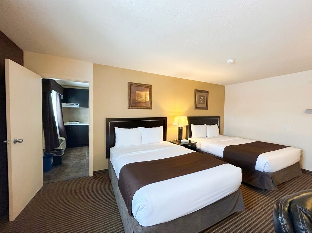 Room, 2 Queen Beds, Non Smoking (Efficiency) | Memory foam beds, individually furnished, desk, laptop workspace