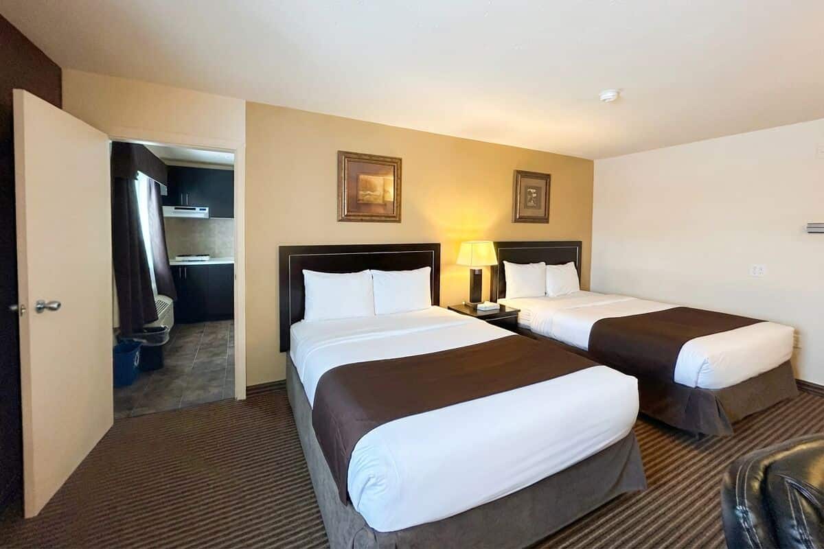 Room, 2 Queen Beds, Non Smoking (Efficiency) | Memory foam beds, individually furnished, desk, laptop workspace