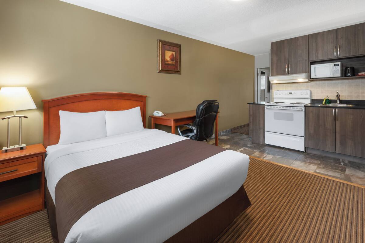 2 Queen Beds, 2-Bedroom, Suite, Non-Smoking | Memory foam beds, desk, laptop workspace