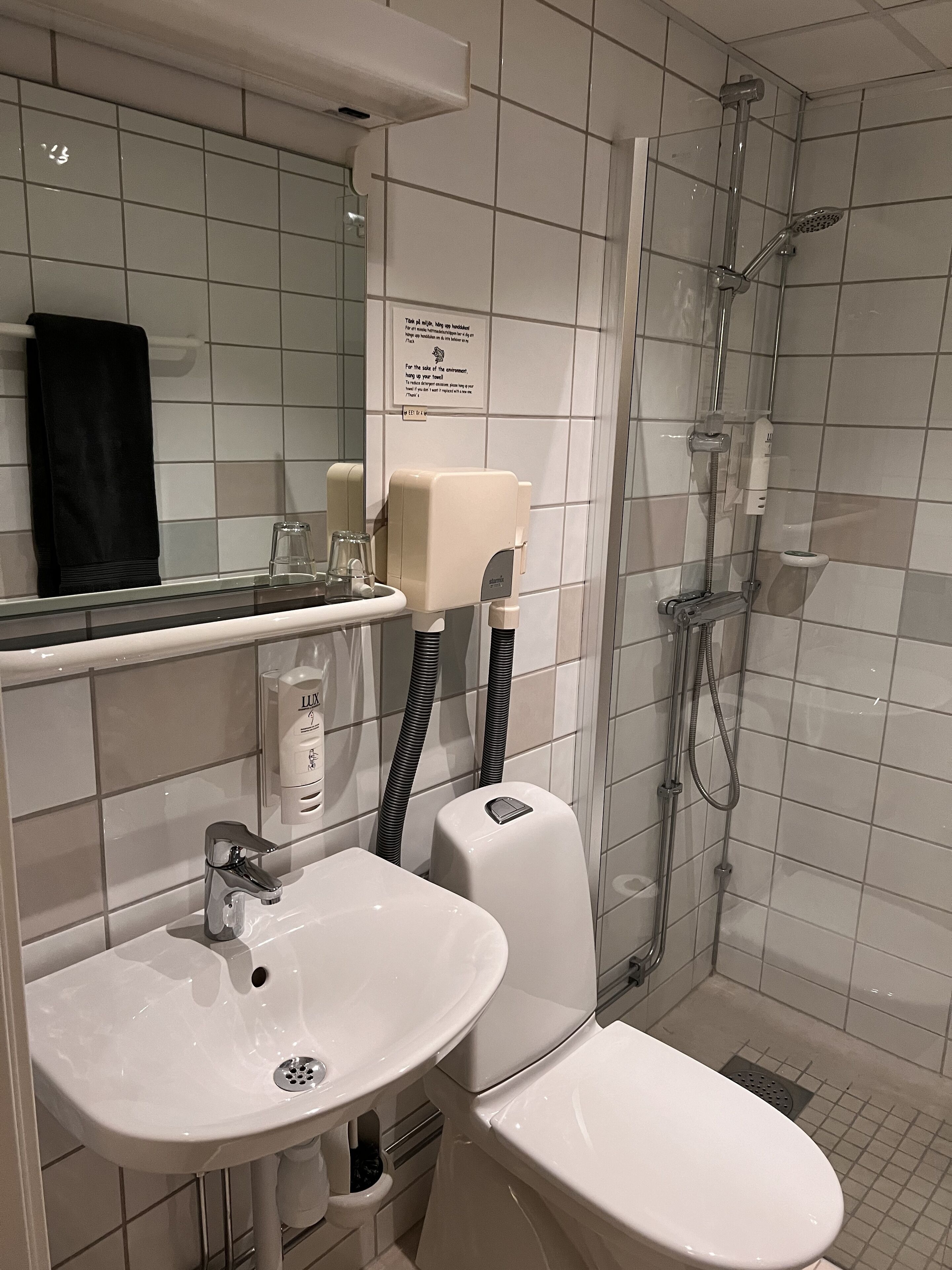 single room - no view | bathroom | shower, hair dryer, towels