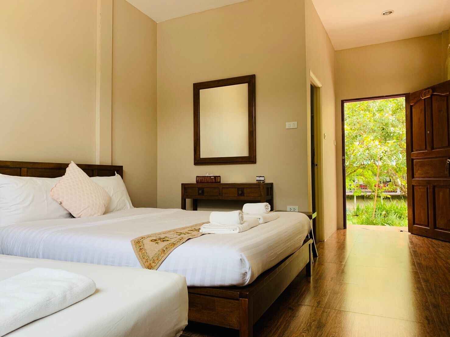 Deluxe Triple Room, Garden View | Desk, free WiFi