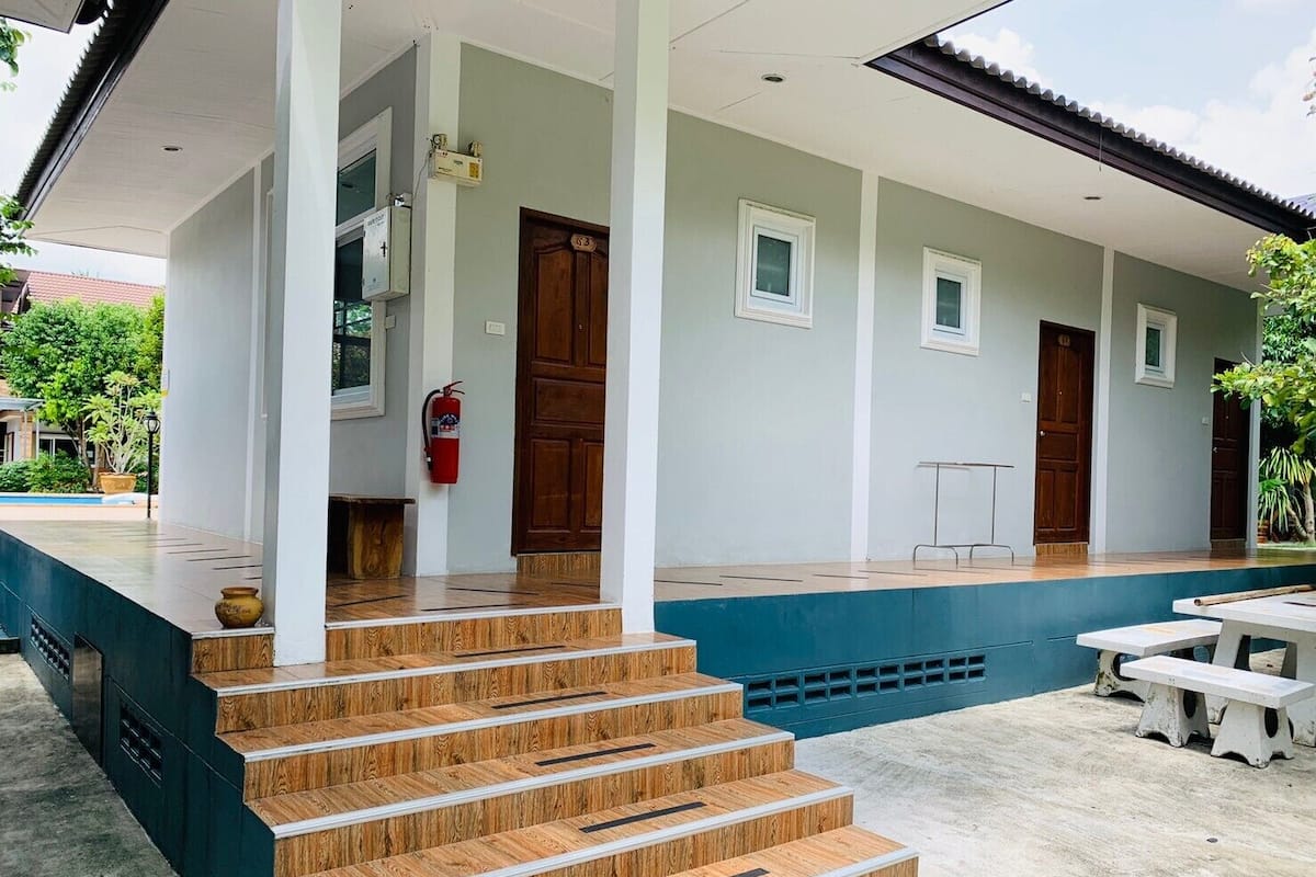 Deluxe Triple Room, Garden View | Terrace/patio