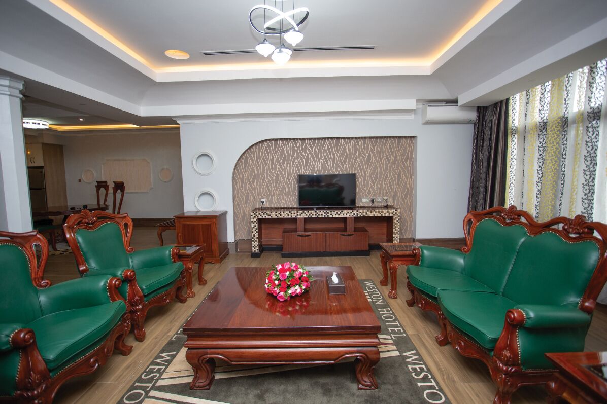 presidential suite | living area | 32-inch flat-screen tv with cable channels, tv