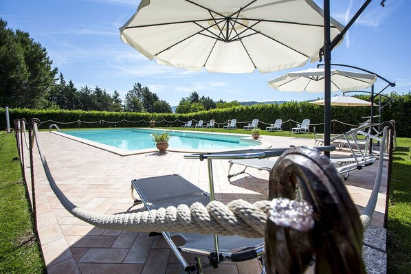 Outdoor pool, sun loungers