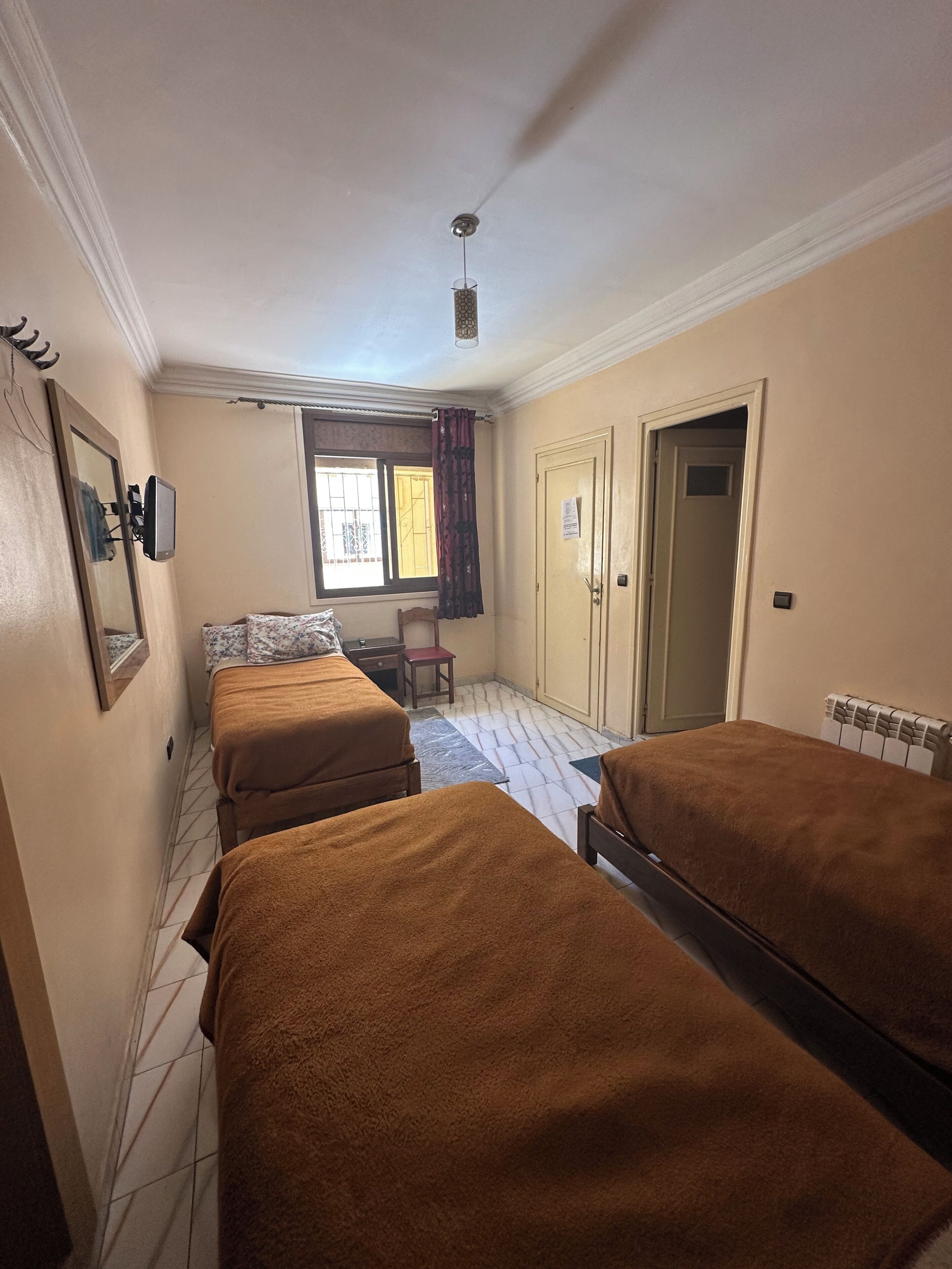 Triple Room | Desk, blackout drapes, rollaway beds, free WiFi