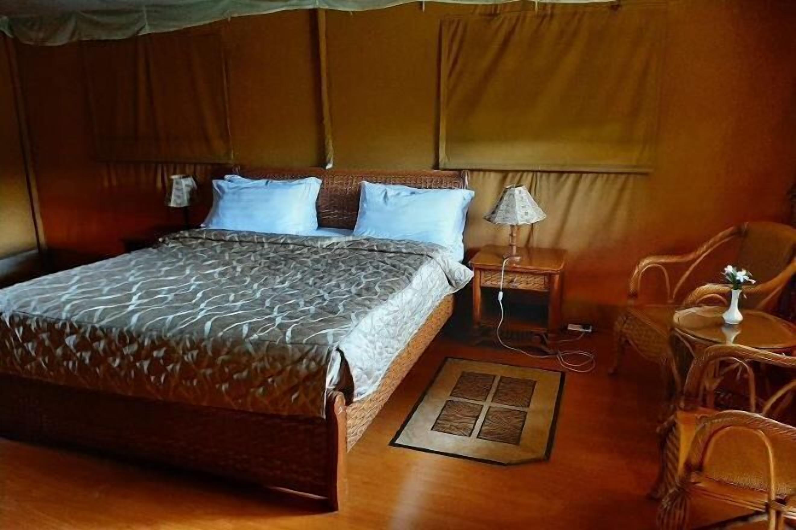 In-room safe, desk, laptop workspace, bed sheets