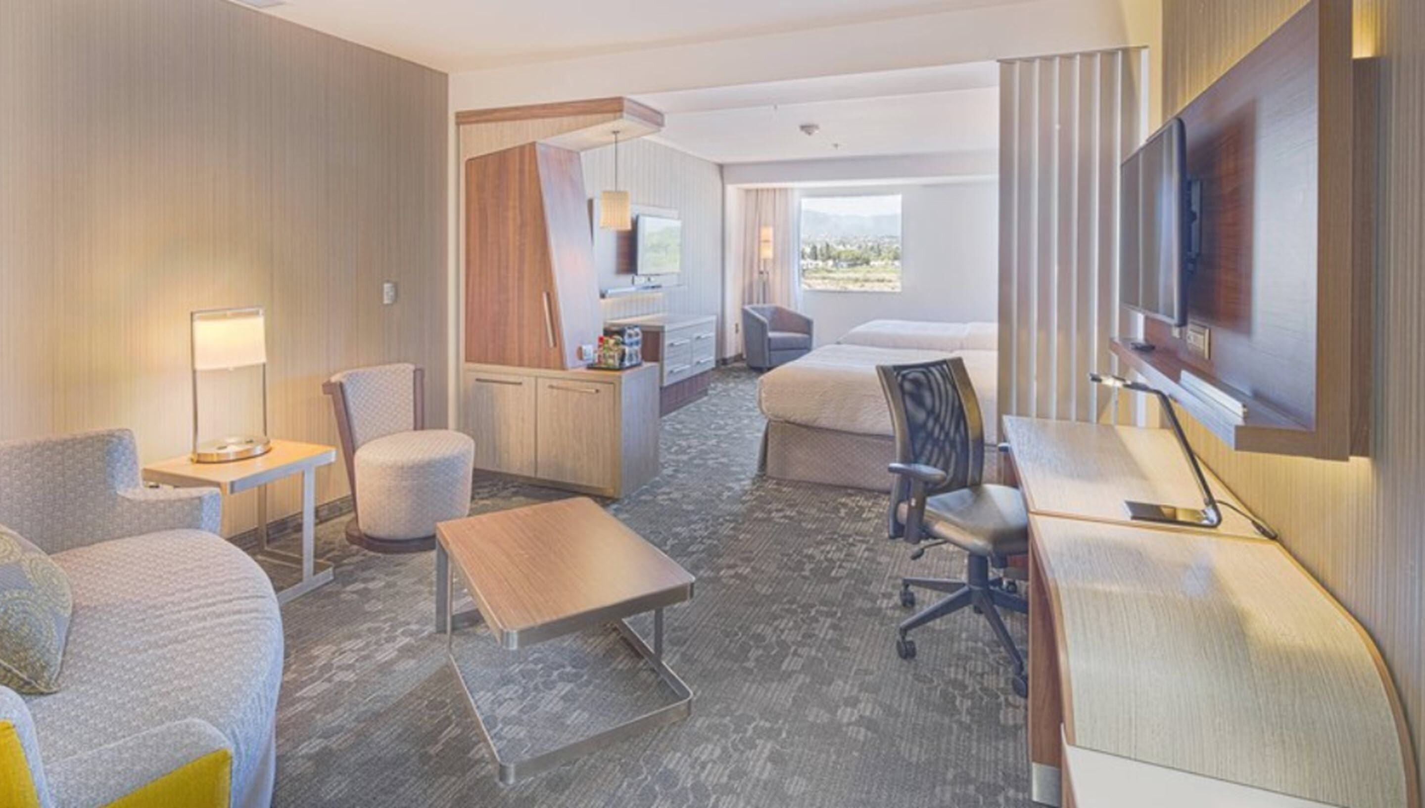 suite, multiple beds | minibar, desk, iron/ironing board, free wifi