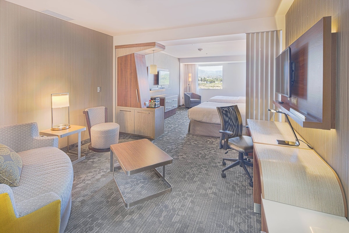 suite, multiple beds | living area | 32-inch led tv with cable channels, tv