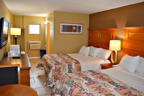 Habitación Deluxe, 2 camas Queen size | Insonorización, wifi gratis y ropa de cama 