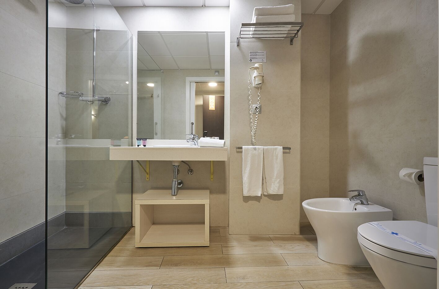 shower, free toiletries, hair dryer, towels