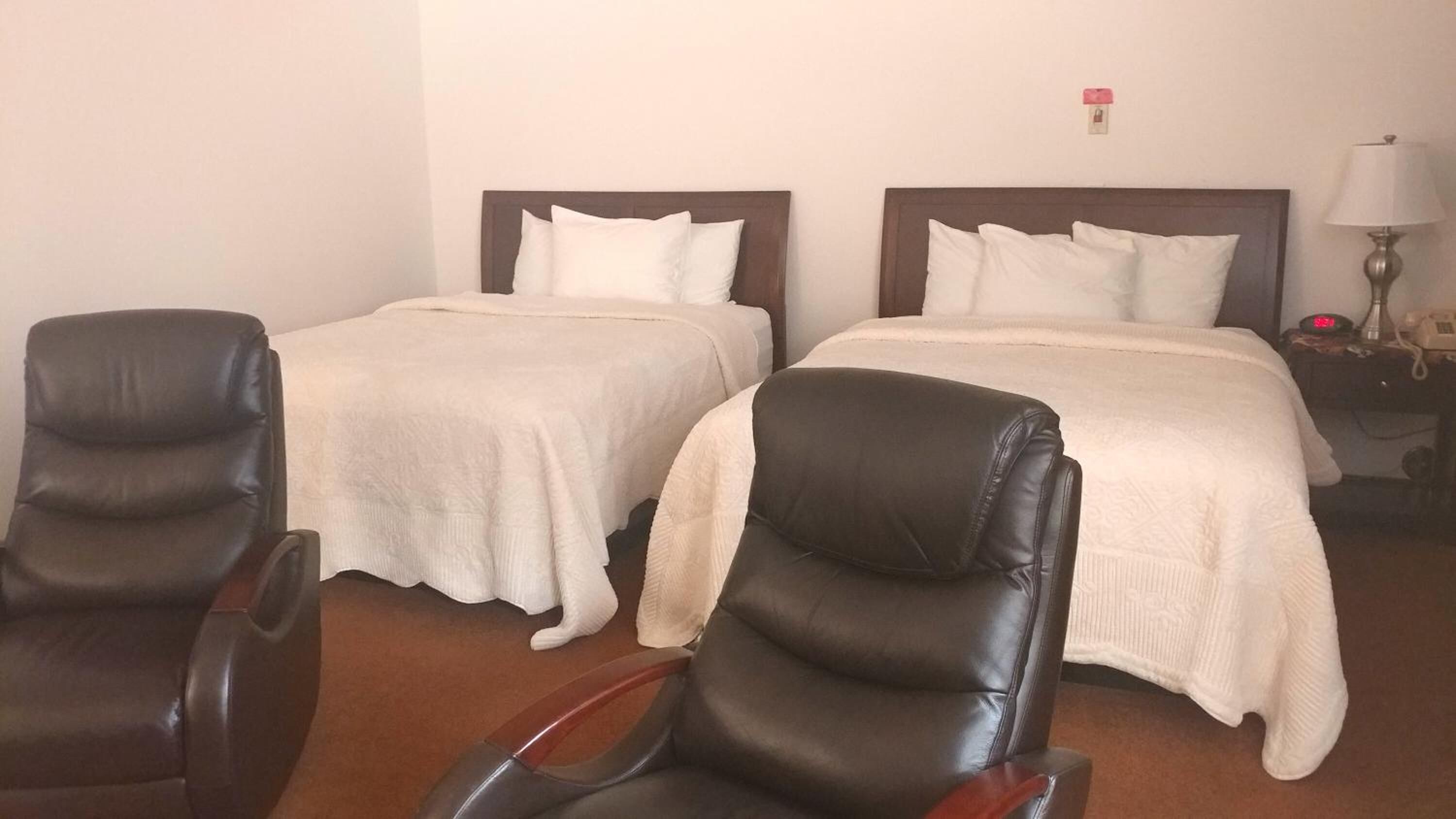 memory-foam beds, blackout curtains, iron/ironing board