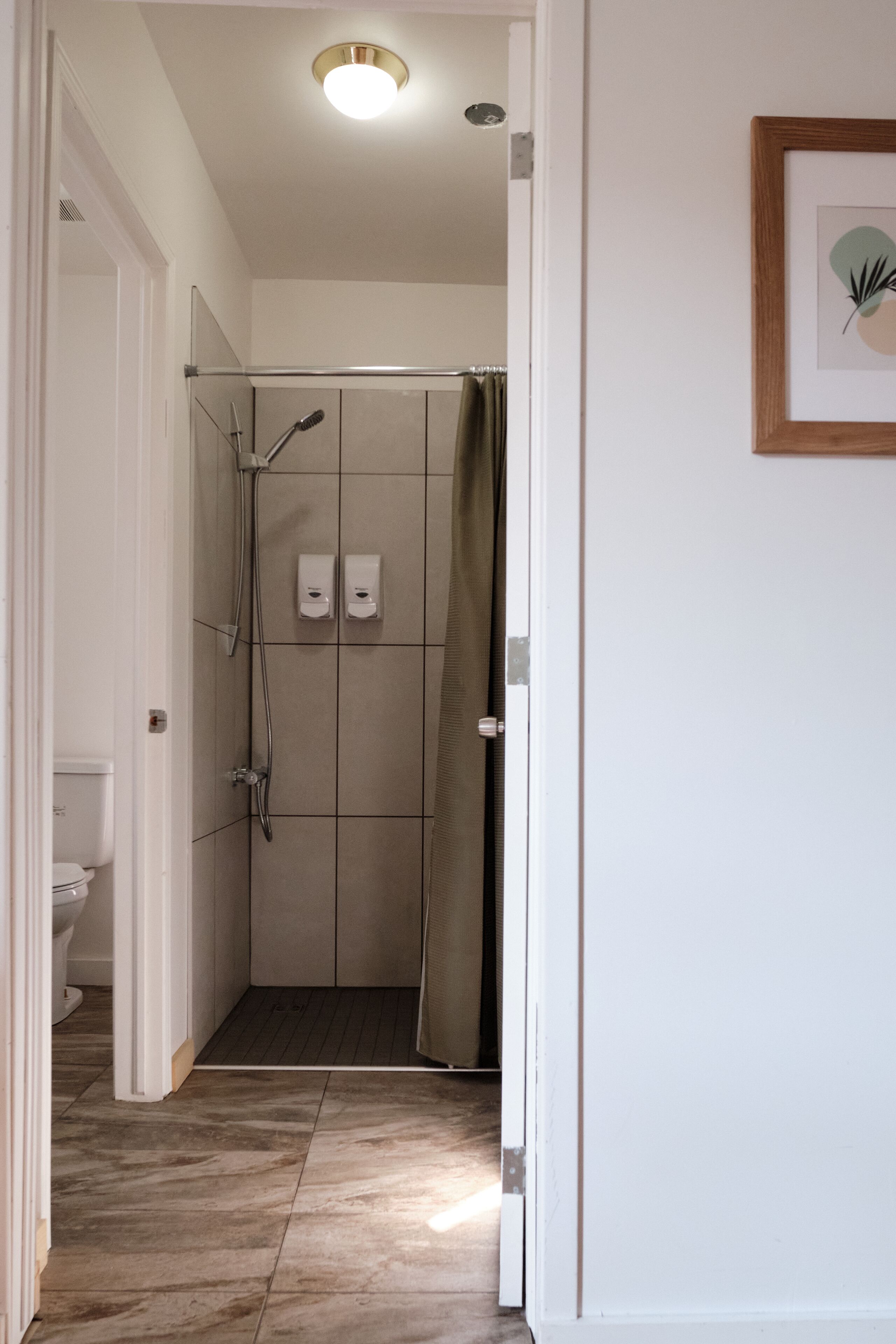 family room, multiple beds, private bathroom 301 | bathroom | free toiletries, hair dryer, towels, soap