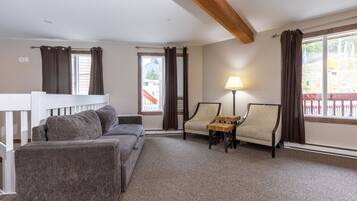 Room, Multiple Beds, Non Smoking | Living area | Flat-screen TV, fireplace