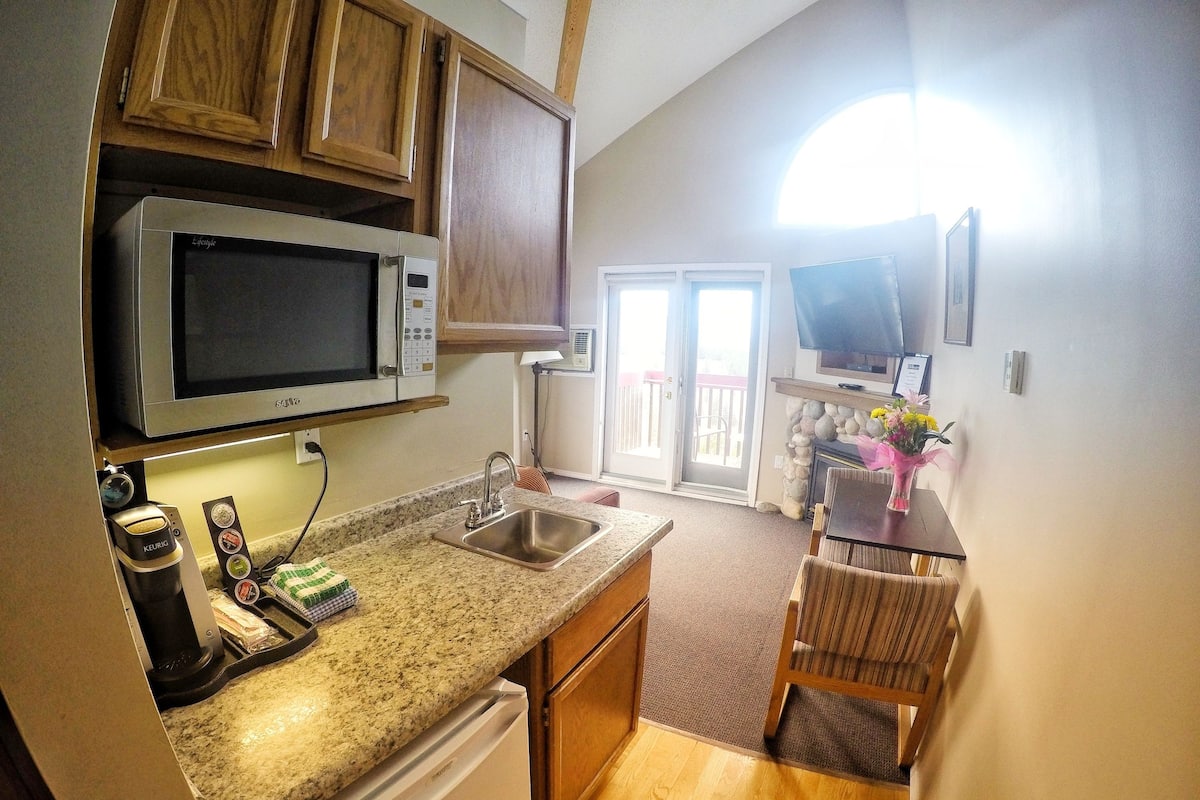 Mini-fridge, microwave, electric kettle, toaster