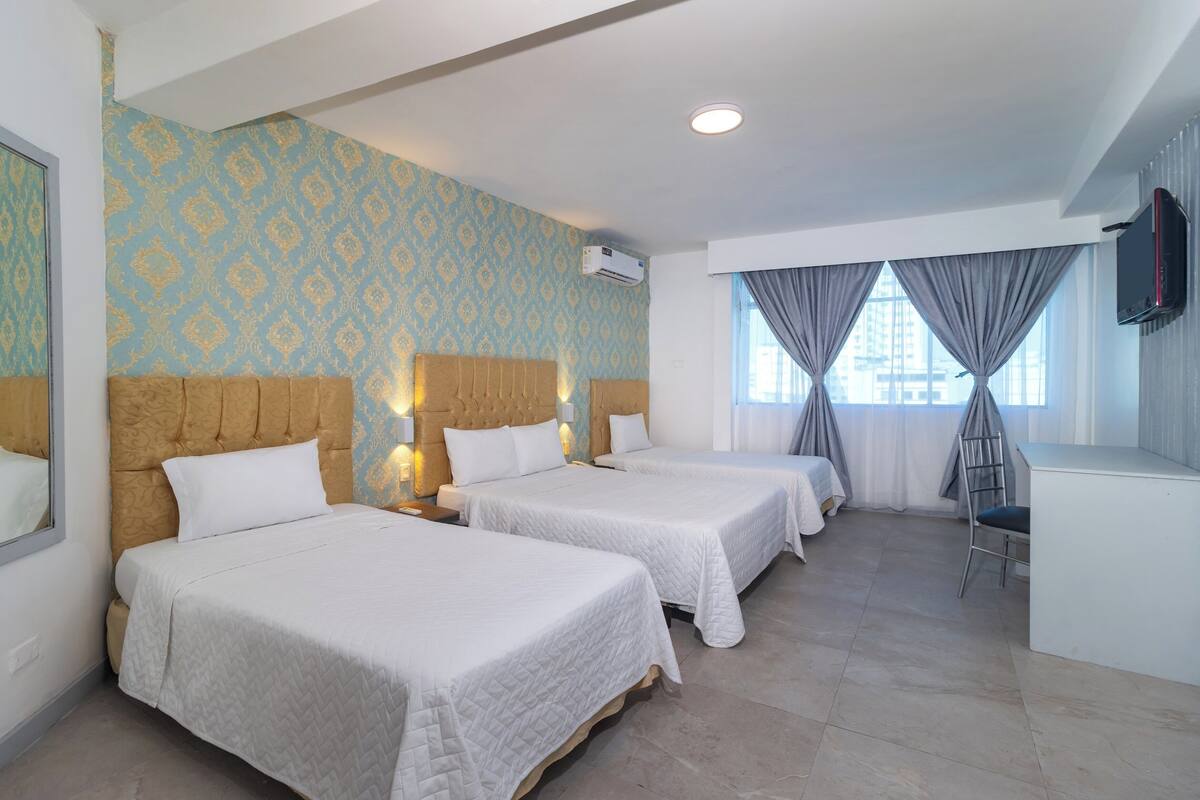 Quarto triplo | 1 quarto, edredons de pluma, frigobar, cofres nos quartos