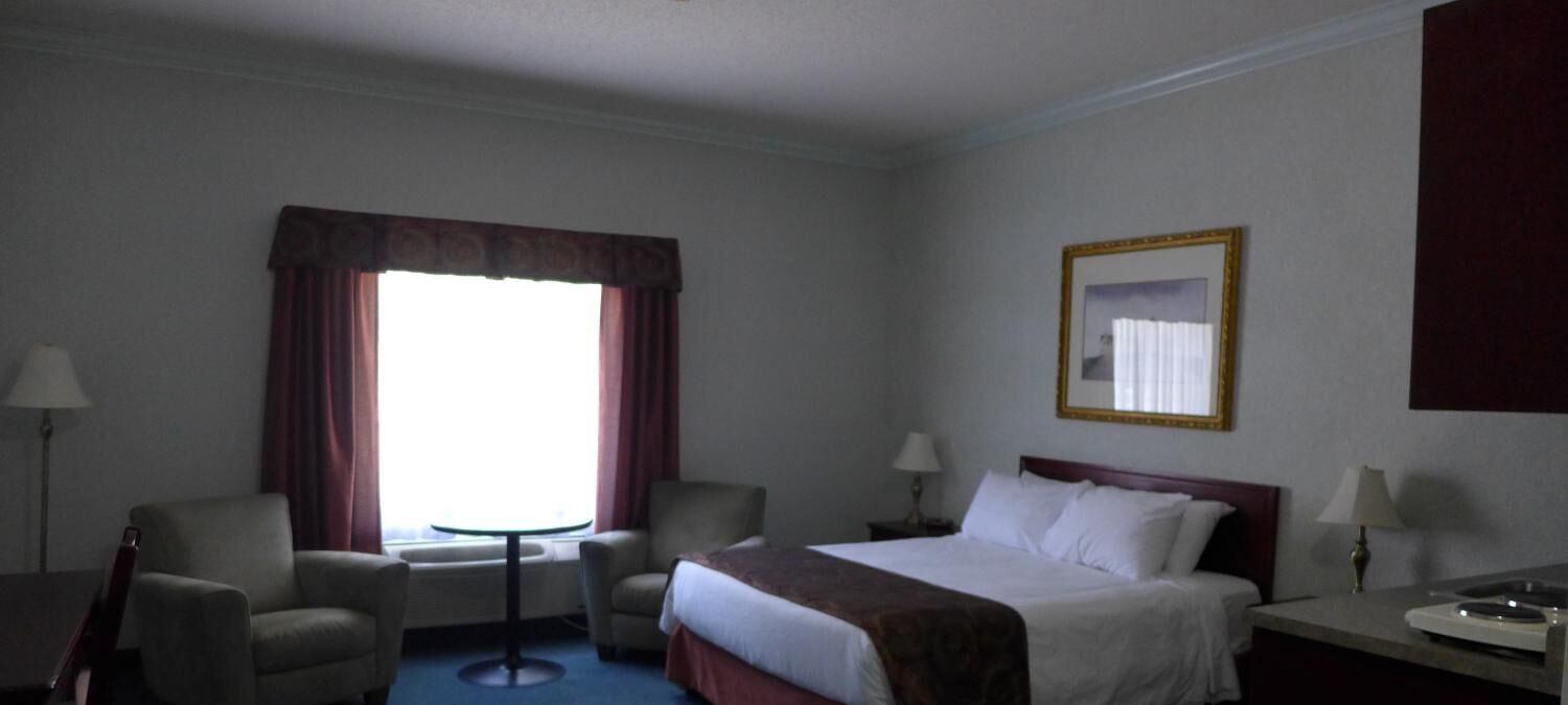 premium bedding, desk, laptop workspace, blackout curtains