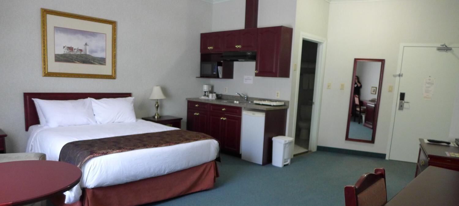 premium bedding, desk, laptop workspace, blackout curtains