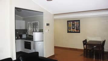 City Apartment, 2 Bedrooms | Living area | TV